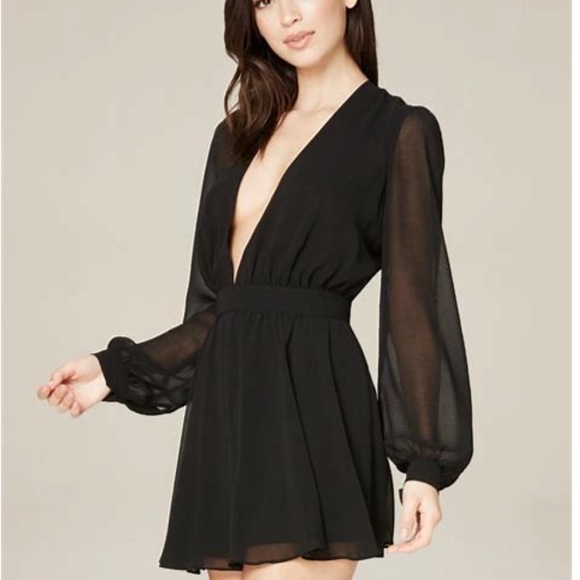 black jumpsuit with sheer sleeves